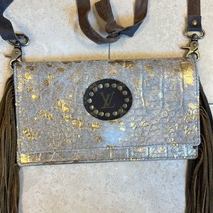 New LV patch fringe leather crossbody
